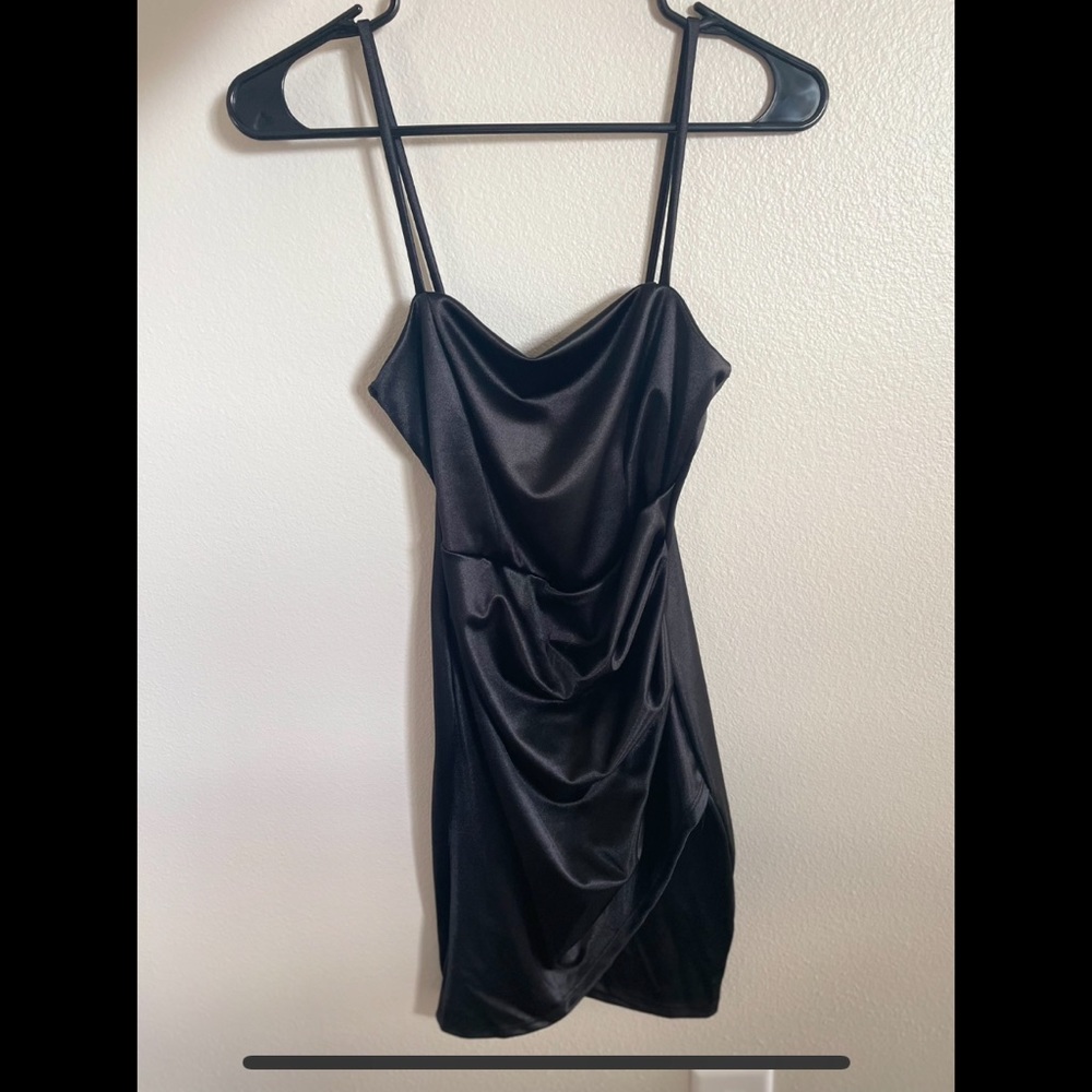 Brand new with tags. Satin, mini black dress from Windsor.